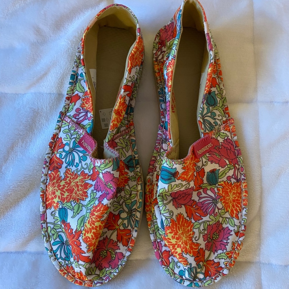 Never worn floral slip on shoes